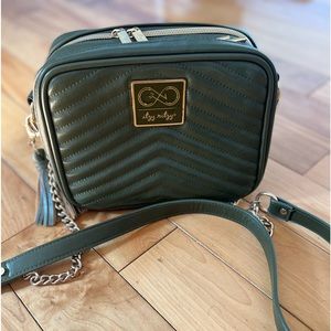 Itzy Ritzy Chelsea Dozer crossbody diaper bag first round!